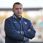 Vlatko Andonovski, Head Coach of Kansas City Current, reacts during the NWSL match between Kansas City Current and San Diego Wave at CPKC Stadium.