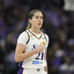 Kate Martin #21 of the Los Angeles Sparks looks on against the Golden State Valkyries in the second quarter during a Commissioner's Cup game at Chase Center on June 15.