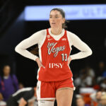 Justine Pissott #13 of the Las Vegas Aces looks on during the game against the Phoenix Mercury on July 11, 2026 at Michelob ULTRA Arena in Las Vegas, Nevada.