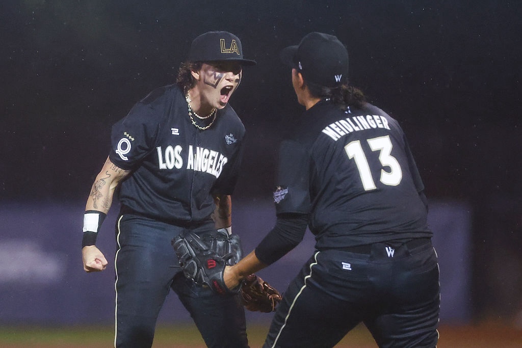 Ashton Lansdell #1 of the Los Angeles Queens and Meggie Meidlinger #13 of the Los Angeles Queens celebrate after the Los Angeles Queens.