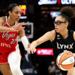 Olivia Miles #5 of the Minnesota Lynx works around A'ja Wilson #22 of the Las Vegas Aces during the second half at Target Center.