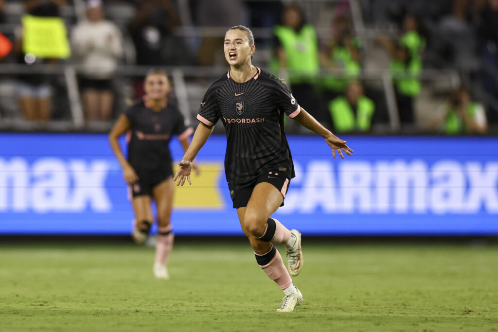 Ally Sentnor #17 of Angel City FC celebrates scoring her first goal during an NWSL match between Angel City FC and Washington Spirit at BMO Stadium.