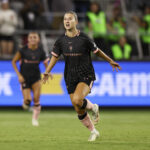 Ally Sentnor #17 of Angel City FC celebrates scoring her first goal during an NWSL match between Angel City FC and Washington Spirit at BMO Stadium.
