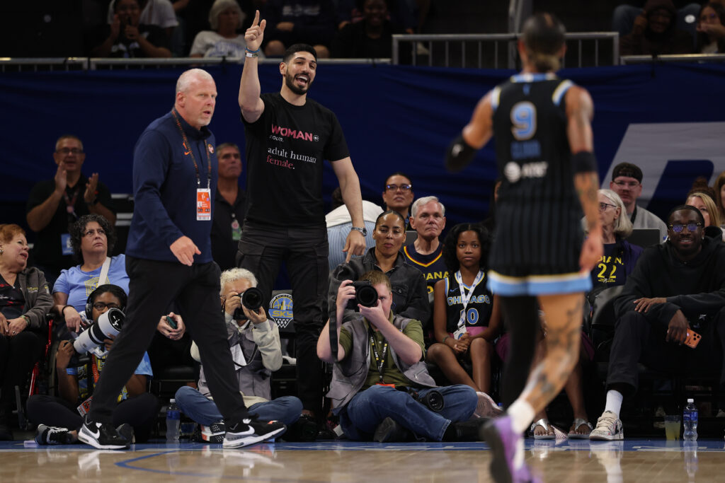 Former basketball player Enes Kanter Freedom and Natasha Cloud #9 of the Chicago Sky yell at one another during the second half between the Chicago Sky and the Indiana Fever at Wintrust Arena on August 23, 2026 in Chicago, Illinois.