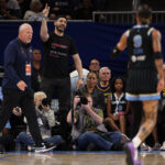 Former basketball player Enes Kanter Freedom and Natasha Cloud #9 of the Chicago Sky yell at one another during the second half between the Chicago Sky and the Indiana Fever at Wintrust Arena on August 23, 2026 in Chicago, Illinois.