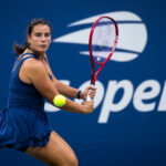 Emma Navarro of the United States in action against Lois Boisson of France in the first round on Day 1 of the US Open at USTA Billie Jean King National Tennis Center.