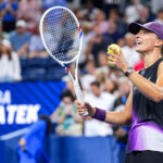 Iga Swiatek smiles after a Women's Singles match on Day Two of the 2026 US Open at USTA Billie Jean King National Tennis Center on Monday.