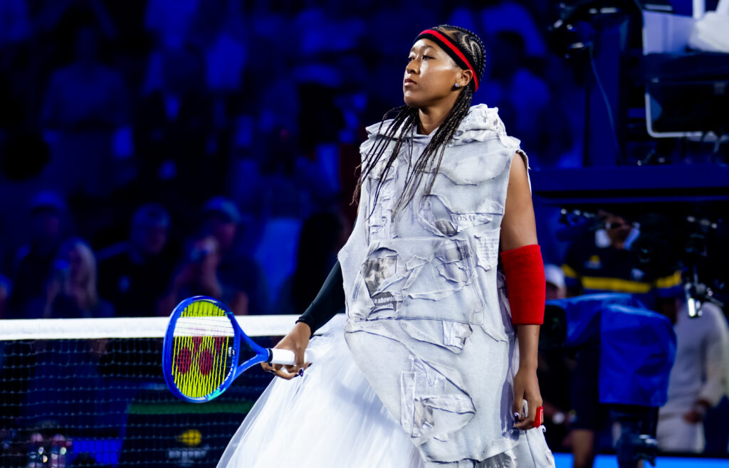 Naomi Osaka of Japan walks onto the court to play against Anastasia Zakharova in the first round on Day 2 of the US Open at USTA Billie Jean King National Tennis Center.