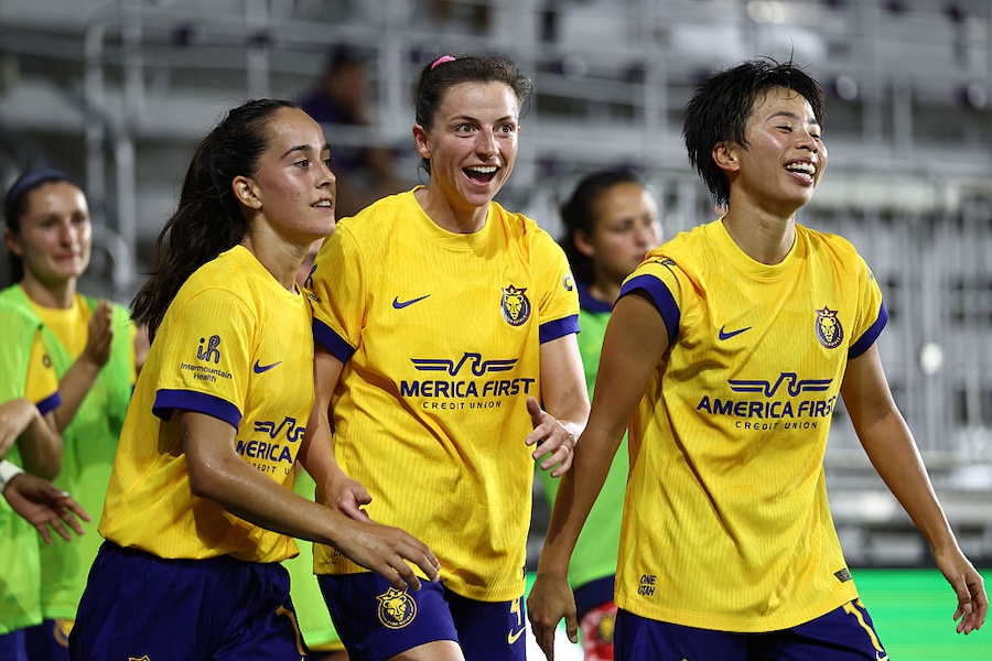 Paige Cronin #4 of Utah Royals celebrates scoring the team's second goal with teammates during the NWSL match between Orlando Pride and Utah Royals at Inter&Co Stadium.