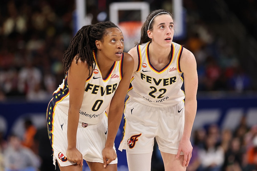 Kelsey Mitchell #0 and Caitlin Clark #22 of the Indiana Fever confer against the Chicago Sky during the first half at Wintrust Arena on August 23, 2026.