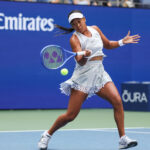 Japan's Naomi Osaka hits a return to Czech Republic's Katerina Siniakova during their women's singles second round tennis match on day five of the US Open tennis tournament at the USTA Billie Jean King National Tennis Center in New York City.
