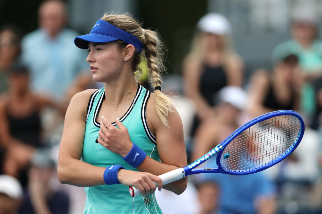 Anna Kalinskaya returns a shot against Anna Blinkova during their Women's Singles First Round match on Day Two of the 2026 US Open.
