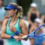 Anna Kalinskaya returns a shot against Anna Blinkova during their Women's Singles First Round match on Day Two of the 2026 US Open.