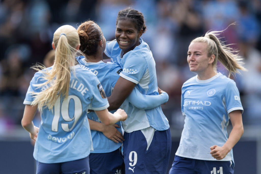 Khadija Shaw of Manchester City celebrates the first goal with goalscorer Mary Fowler and team mates during the Barclays Women's Super League 2026/27 match between Manchester City and Birmingham City at Joie Stadium on September 6, 2026 in Manchester, England.