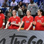 Rhyne Howard #6, Caitlin Clark #12, Paige Bueckers #4, and Sonia Citron #5 look on during the game against the Hungary Women's National Team during the 2026 FIBA Women's Basketball World Cup.
