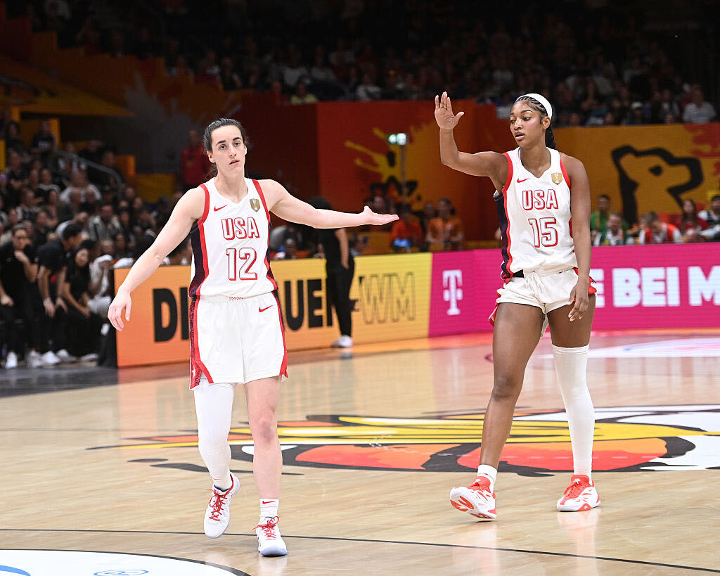 Caitlin Clark #12 high fives Angel Reese #15 of the USA Basketball Women's National Team during the game against the Hungary Women's National Team during the 2026 FIBA Women's Basketball World Cup on September 10, 2026 at Berlin Arena in Berlin, Germany.