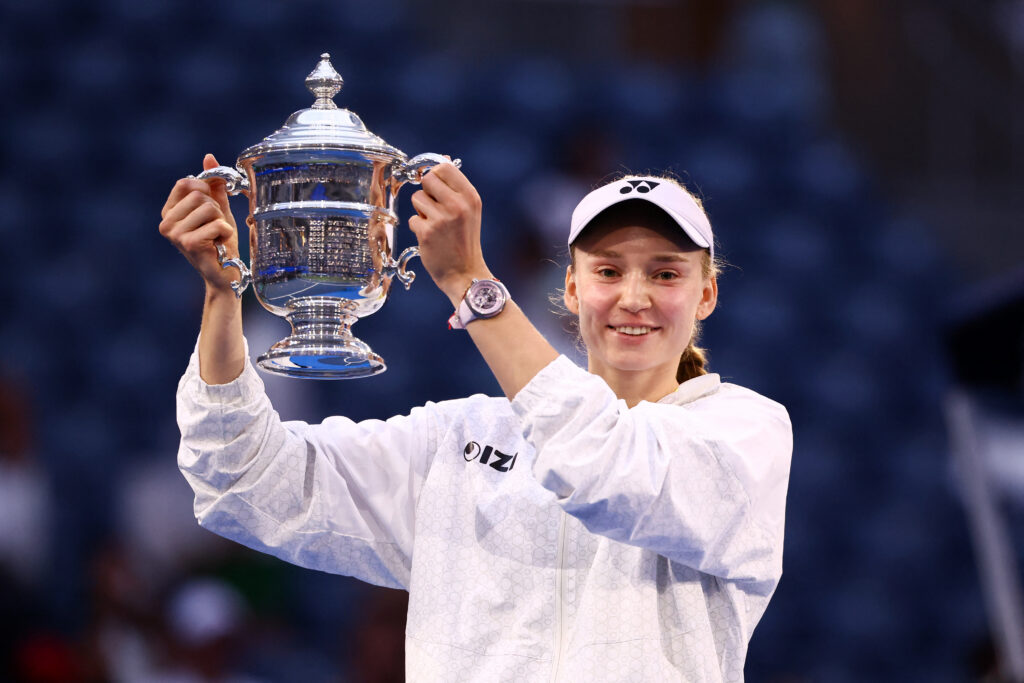 Kazakhstan's Elena Rybakina holds up the winner's trophy after winning the women's singles final tennis match against Belarus's Aryna Sabalenka on day fourteen of the US Open tennis tournament.