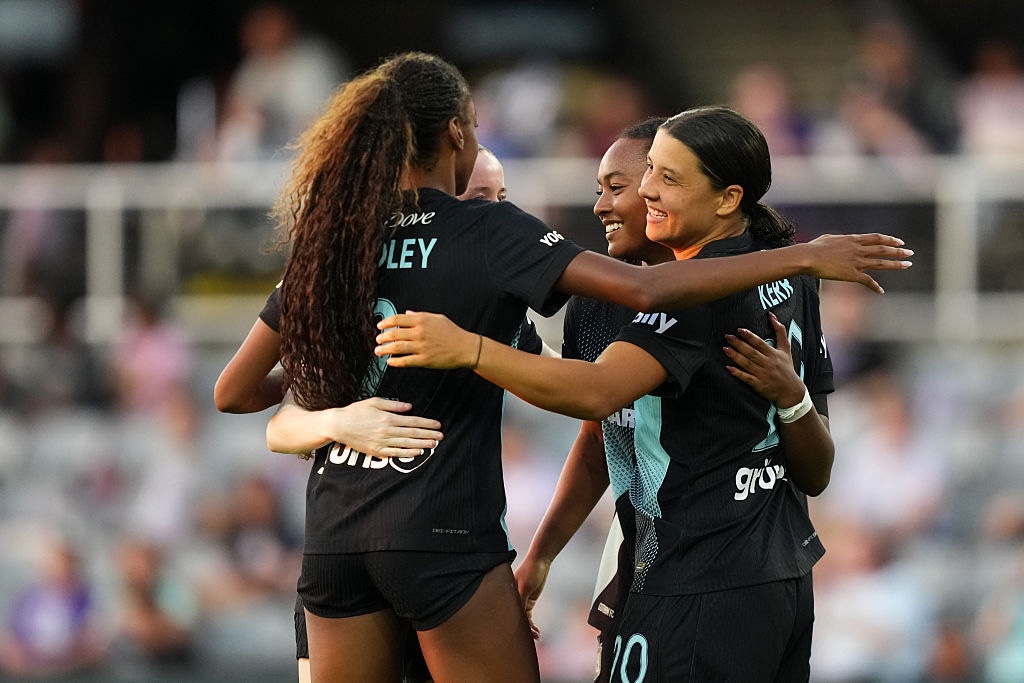 Jaedyn Shaw #10 of NJ/NY Gotham FC celebrates scoring the team's second goal with teammates during the NWSL match between Racing Louisville FC and NJ/NY Gotham FC.