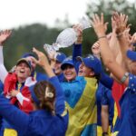 Linn Grant of Team Europe lifts the Solheim Cup trophy with her team, during the trophy presentation ceremony, following a 15-13 victory in the the Sunday singles matches of the Solheim Cup 2026.