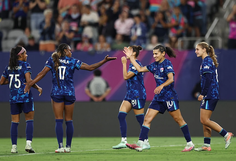Kenza Dali #10 of San Diego Wave FC and teammates celebrate their team's second goal scored by teammate Kennedy Wesley #2 (not in frame) during the NWSL match between San Diego Wave FC and Kansas City Current.