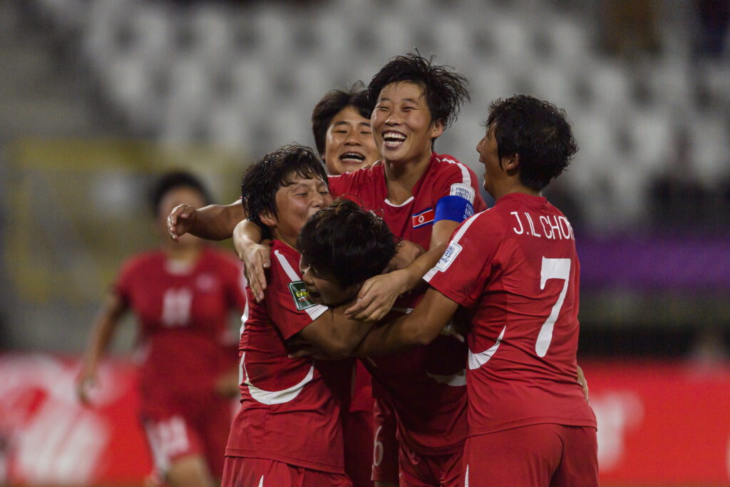 Ryu Gyong So of DPR Korea (C) celebrates her goal with teammates during the FIFA U20 Womens World Cup semi-final match between DPR Korea and Colombia at Stadion Miejski LKS Lodz.