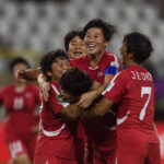 Ryu Gyong So of DPR Korea (C) celebrates her goal with teammates during the FIFA U20 Womens World Cup semi-final match between DPR Korea and Colombia at Stadion Miejski LKS Lodz.