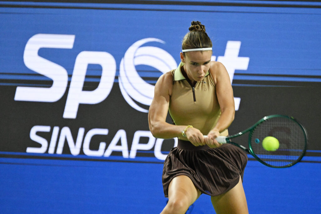 Russia's Tatiana Prozorova hits a return against Philippines' Alexandra Eala during the WTA Singapore Open Tennis round of 16 in Singapore.