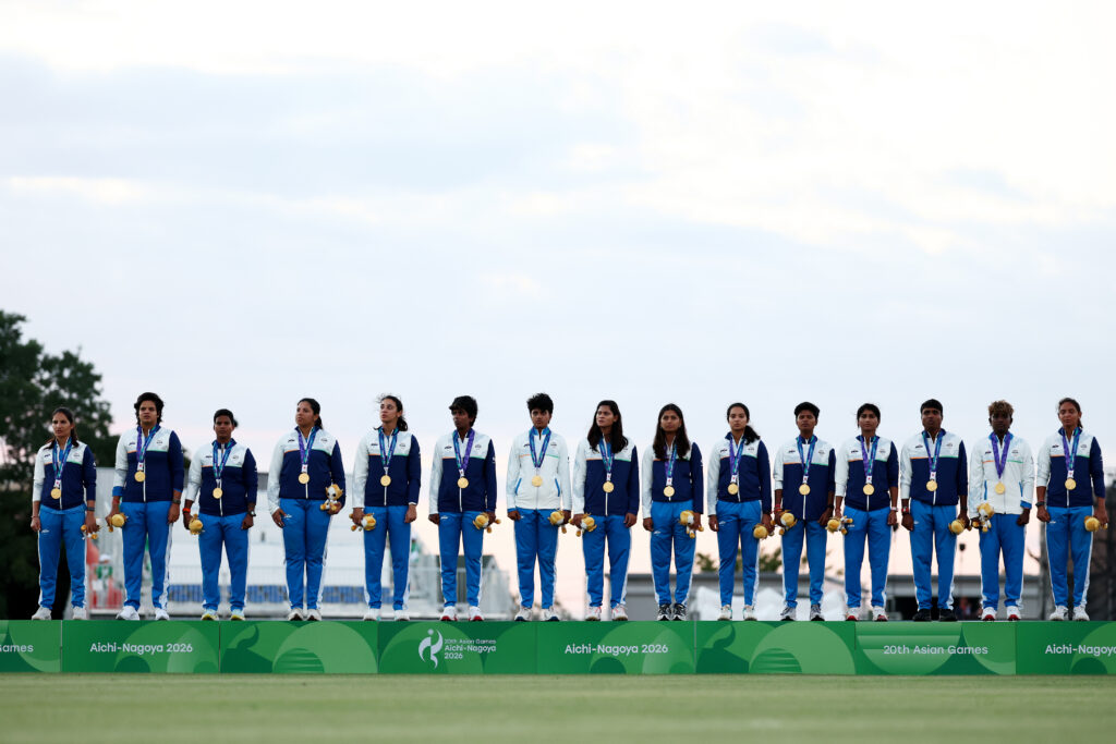 Gold medalists India stand for the national anthem during the Cricket Women's medal ceremony on day three of the 2026 Asian Games Aichi-Nagoya at Korogi Athletic Park on September 22, 2026 in Nisshin, Aichi, Japan.