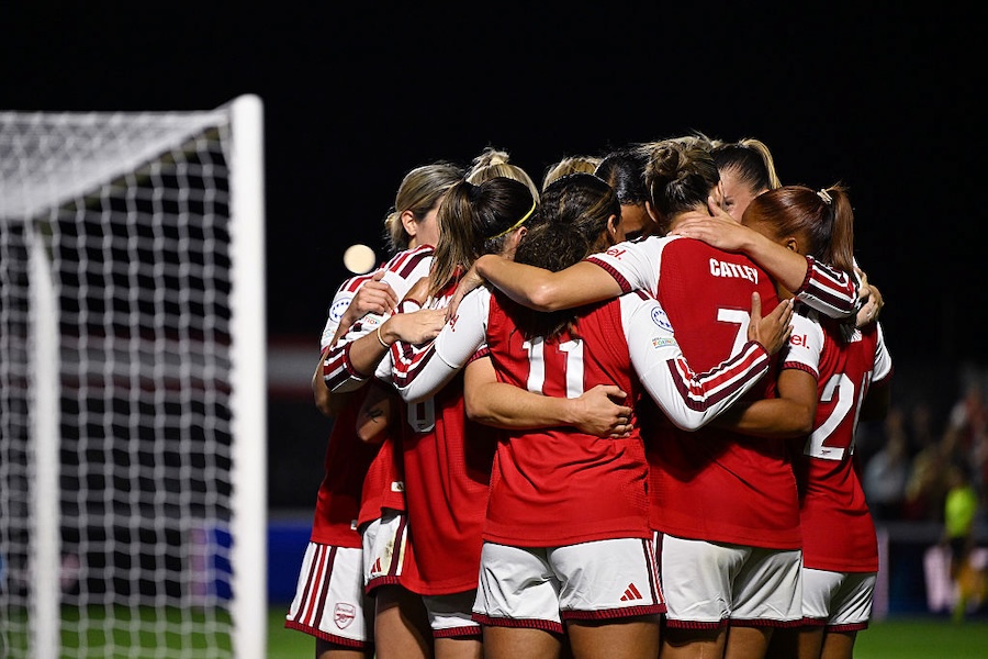 Mariona Caldentey of Arsenal celebrates with teammates Olivia Smith, Steph Catley and Taylor Hinds after scoring her team's first goal during the UEFA Women's Champions League 2026/27 League Phase.