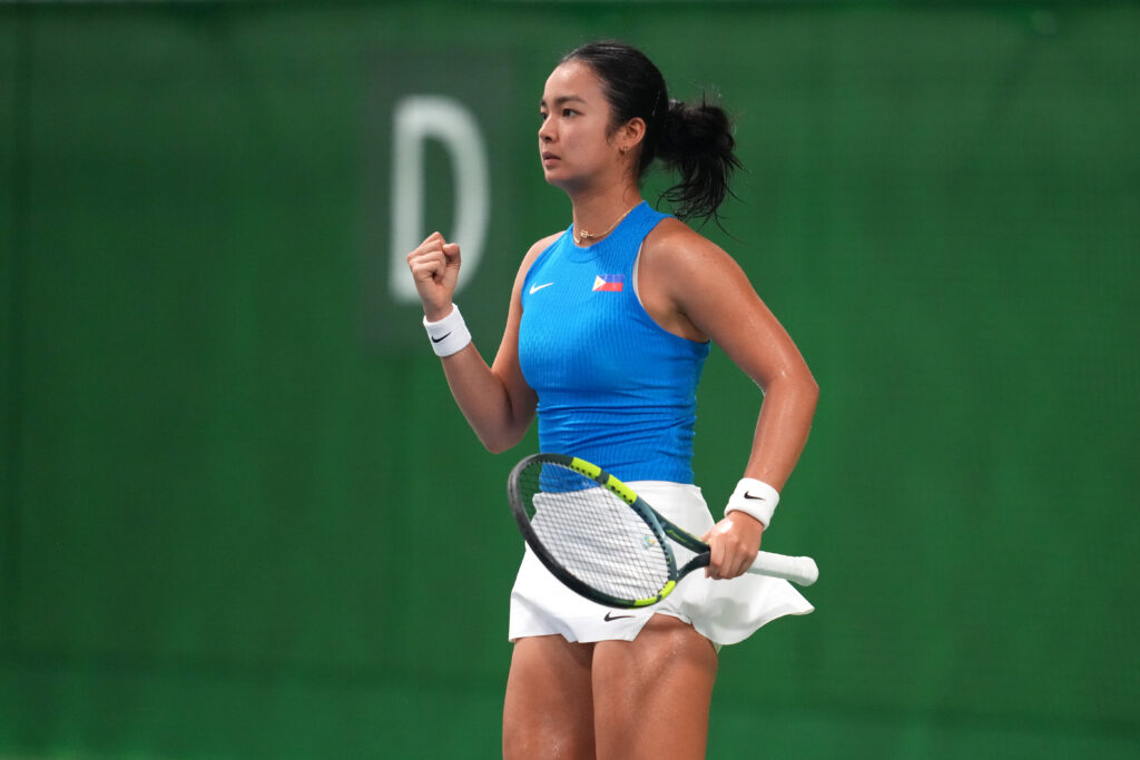 Alexandra Eala of the Philippines reacts a point during the Women's Singles Second Round match against Patcharin Cheapchandej of Thailand on day nine of the 20th Asian Games.