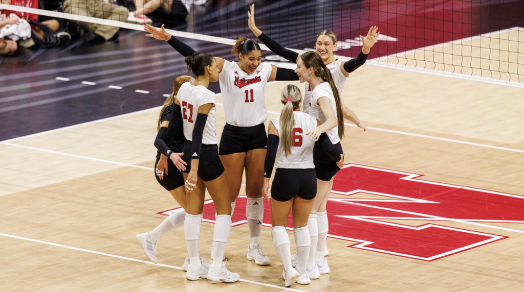 Nebraska volleyball celebrates a point against FGCU.