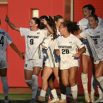 Michigan State's women's soccer team celebrates win.