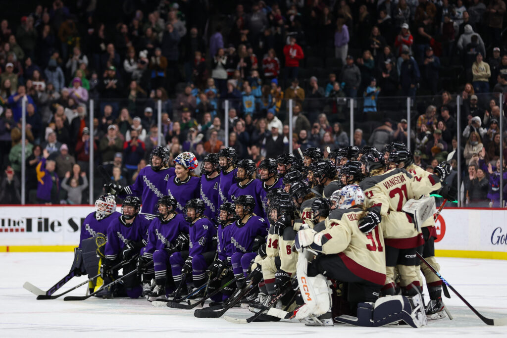 Jan 6, 2024; St. Paul, Minnesota, USA; Minnesota and Montreal players pose for a photo after a PWHL ice hockey game at XCel Energy Center.