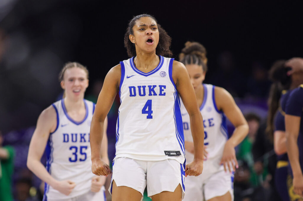Duke Blue Devils guard Riley Nelson (4) celebrates after a victory over the Notre Dame Fighting Irish at Gas South Arena.