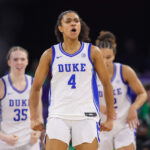 Duke Blue Devils guard Riley Nelson (4) celebrates after a victory over the Notre Dame Fighting Irish at Gas South Arena.