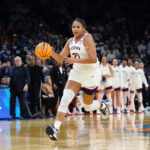 UConn Huskies forward Sarah Strong (21) controls the ball against the South Carolina Gamecocks in the first half during a semifinal of the Final Four.