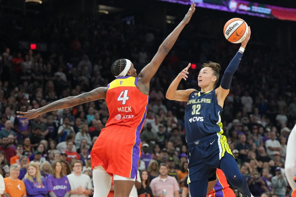 Dallas Wings forward Jessica Shepard (32) shoots over Phoenix Mercury forward Natasha Mack (4) in the first half at Mortgage Matchup Center.