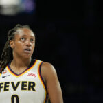 Indiana Fever guard Kelsey Mitchell (0) looks outward during the fourth quarter of game one of the first round for the 2026 WNBA Playoffs against the Las Vegas Aces at Michelob Ultra Arena.