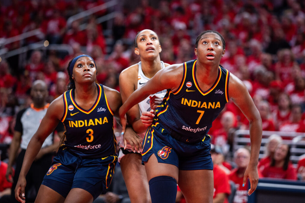 Indiana Fever center Aliyah Boston (7) boxes out Las Vegas Aces center A'ja Wilson (22) during game two of the first round against the Las Vegas Aces for the 2026 WNBA Playoffs at Gainbridge Fieldhouse.