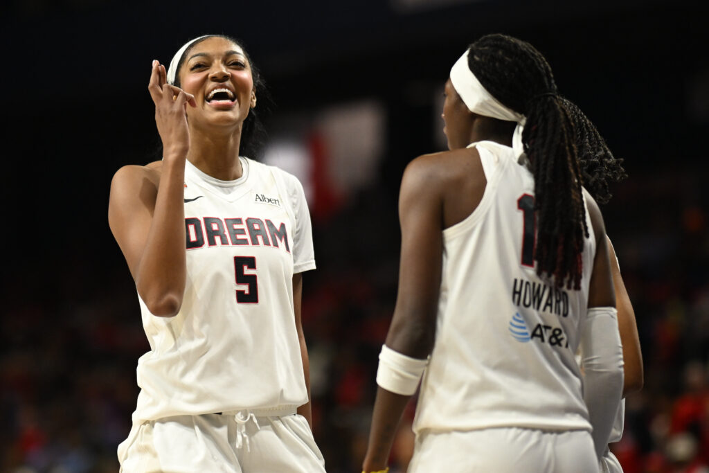 Atlanta Dream forward Angel Reese (5) celebrates a play against the Washington Mystics during the fourth quarter of game two of the first round for the 2026 WNBA Playoffs at CareFirst Arena.