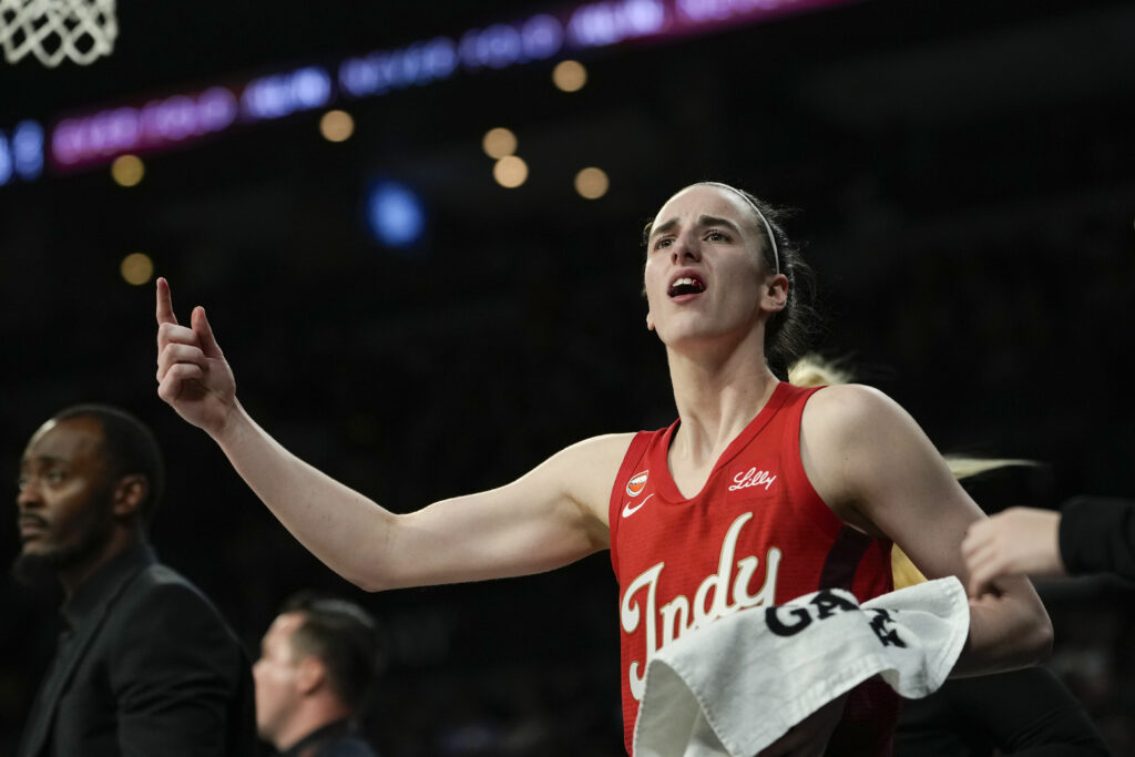 Indiana Fever guard Caitlin Clark (22) walks off the court bleeding during the fourth quarter of game three of the first round for the 2026 WNBA Playoffs against the Las Vegas Aces at Michelob Ultra Arena.