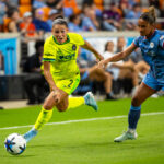 Washington Spirit forward Trinity Rodman (2) advances the ball during the first half of a game against the Houston Dash at Shell Energy Stadium.