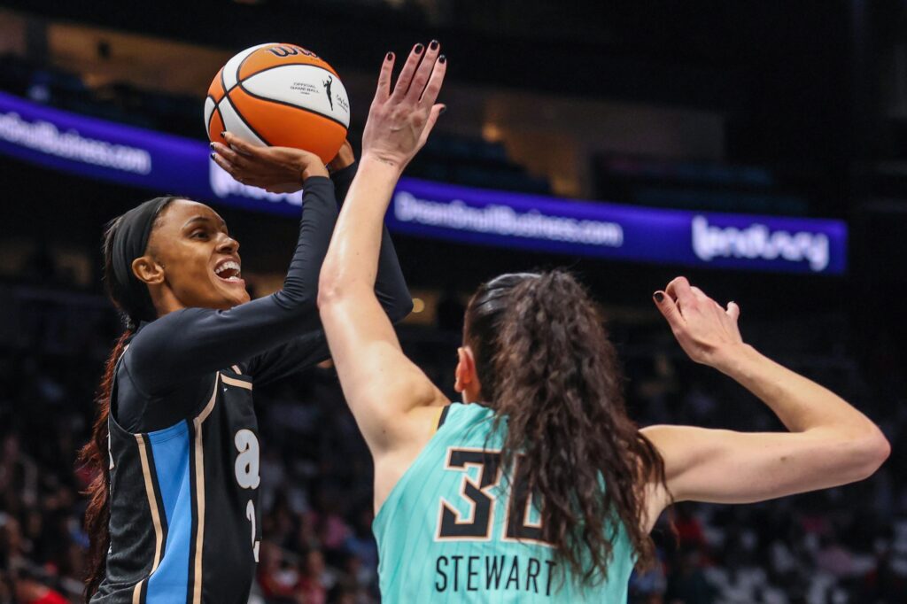 Atlanta Dream forward DeWanna Bonner (24) attempts a shot against New York Liberty forward Breanna Stewart (30) during the first quarter during game two of the second round for the 2026 WNBA Playoffs at State Farm Arena.