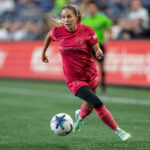 North Carolina Courage midfielder Ashley Sanchez (2) dribbles the ball against the Seattle Reign at Lumen Field.