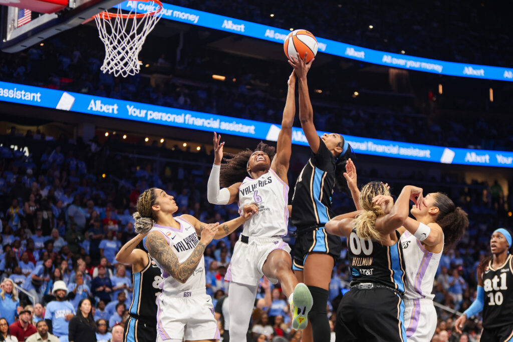 Oct 21, 2026; Atlanta, Georgia, USA; Golden State Valkyries guard Kaila Charles (6) and Atlanta Dream forward Angel Reese (5) reach for a rebound in the fourth quarter during game three of the 2026 WNBA Finals at State Farm Arena.