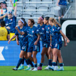 San Diego Wave FC teammates celebrate after a goal by forward Trinity Byars (15) during the second half against Boston Legacy FC at Snapdragon Stadium.