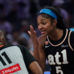 Atlanta Dream forward Angel Reese (5) talks with referee Randy Richardson (11) during the game against the Golden State Valkyries in the third quarter of game five of the 2026 WNBA Finals at Chase Center.