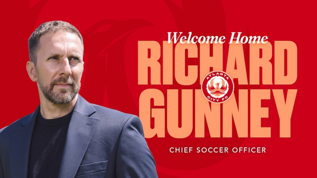 Red graphic featuring a head shot of new Atlanta City Chief Soccer Officer Richard Gunney, as well as graphic text of his name, and the Atlanta City logo.