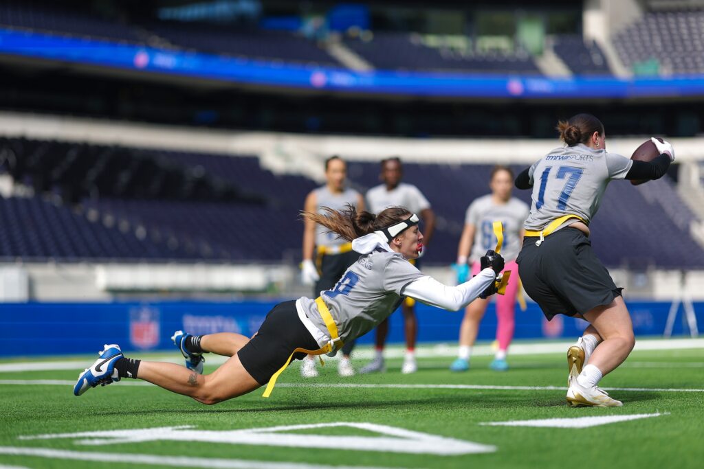 Two women’s flag football players trying out for TMRW Sports and the NFL’s pro league at London’s Tottenham Hotspur Stadium.
