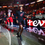 Brianna Turner #11 of the Indiana Fever run on to the court before Game 3 of the WNBA Playoffs semifinals against the Las Vegas Aces on September 26, 2025 at Gainbridge Fieldhouse in Indianapolis, Indiana.